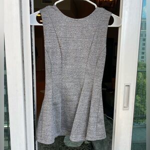 Heather gray H&M peplum work top with darts/pleats and exposed zipper size XS